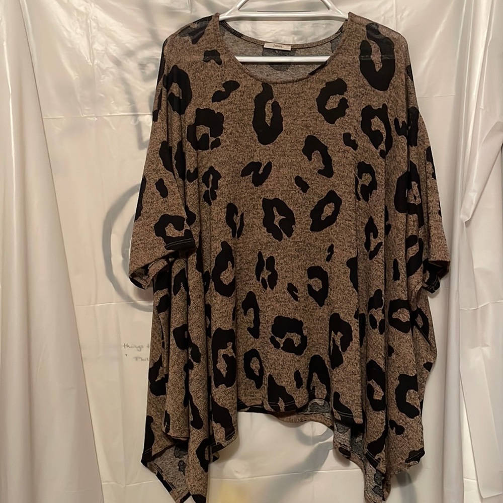 Large loose fit ….light sweater
